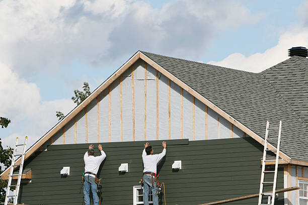 Professional Emergency Siding Repair technician working in Belmont, MA